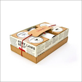 Carnivore Club Bbq Spice Set In Box Tied With Red Ribbon On Kiln Dried Wood Fuels