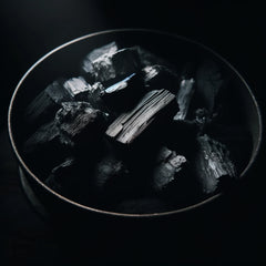 lump charcoal in a bowl